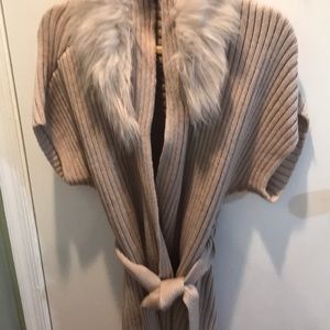 Women’s sweater with belt.